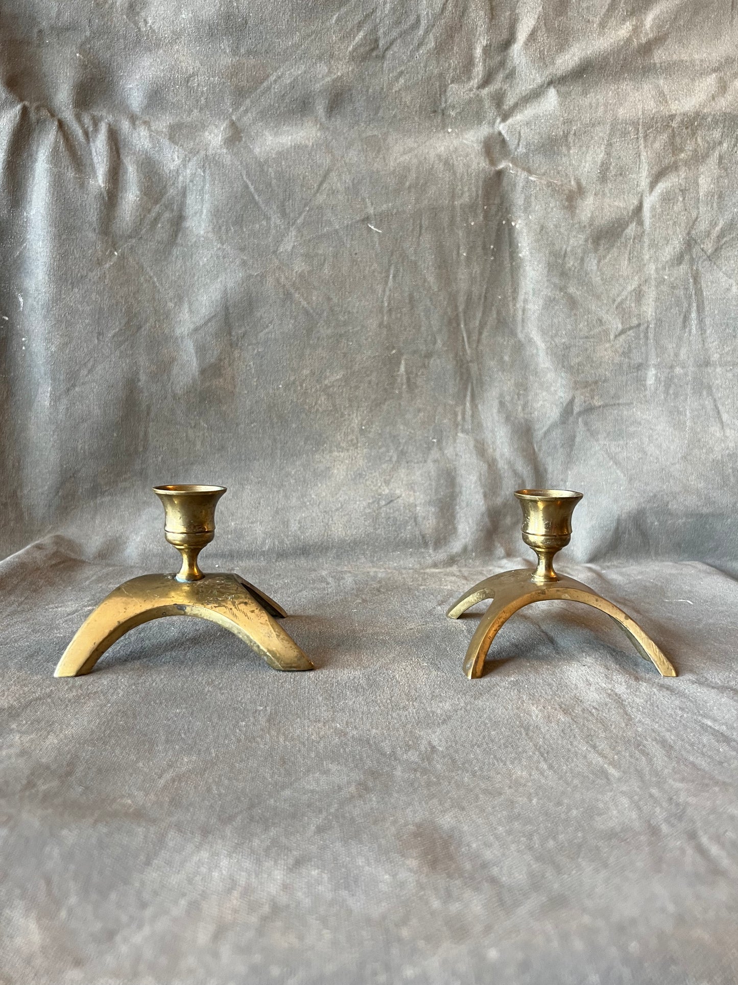 Pair of Vintage Brass Atomic Retro Curved Tripod Leg Candle Holders