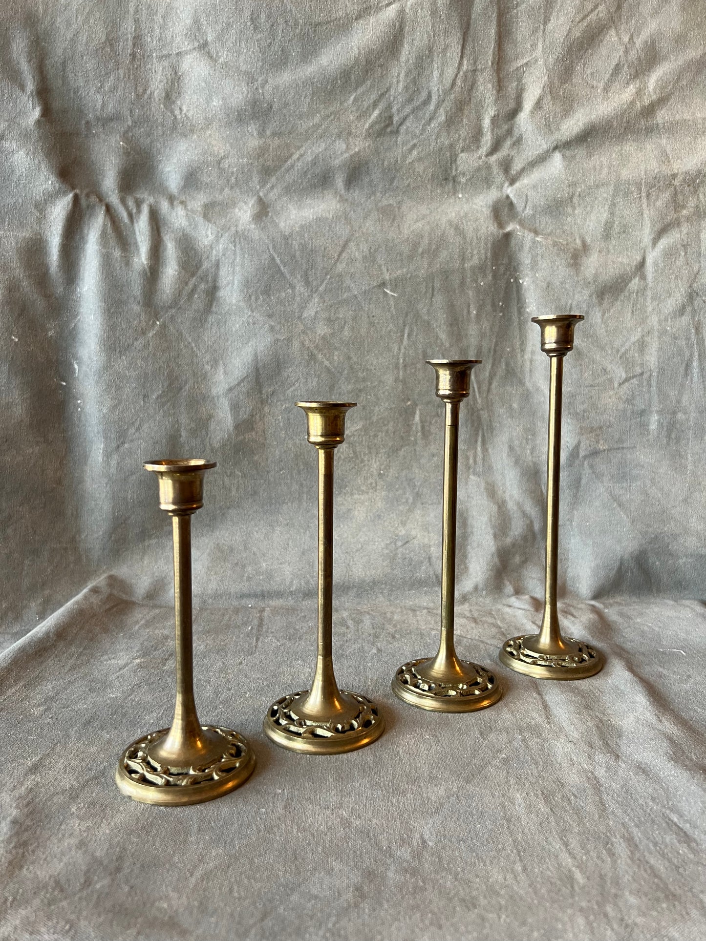 Set of Four Solid Brass Graduated Candle Holders